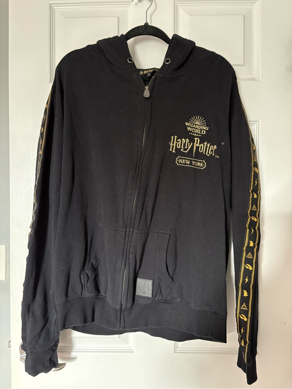 Warner Bros. Harry Potter Black Hoodie with Gold Sleeve Accents - Women’s Large